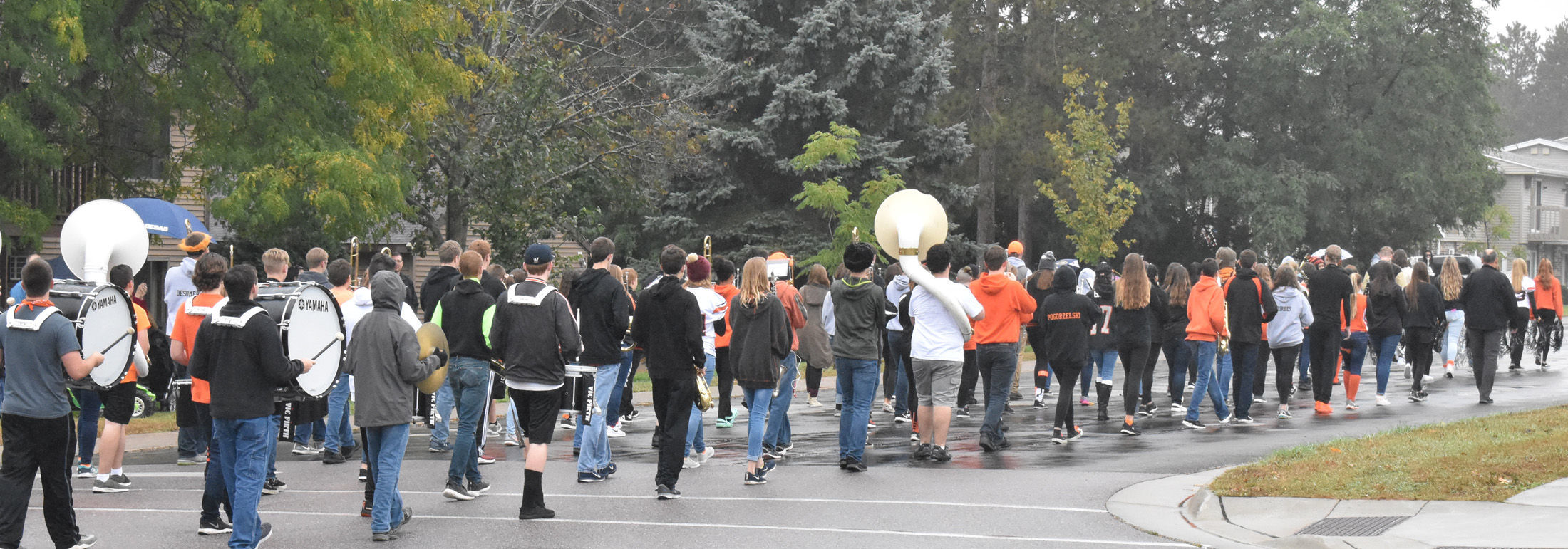 Homecoming marching in the rain